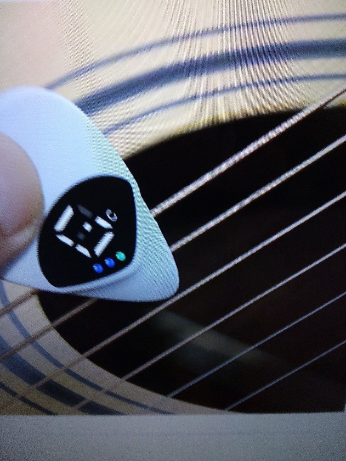 Guitar tuner pick